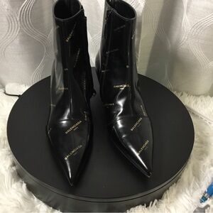 Balenciaga Black Patent Pointed Ankle Booties with Gold Logo